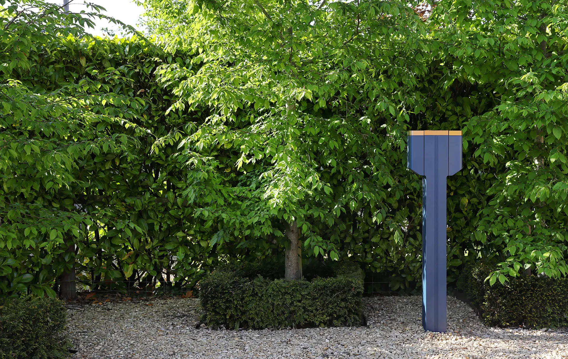 Simpson & Partners EV charger installed in a garden setting